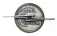 Opel - 100 000 KM - o.J. - Kühlerplakette  vz